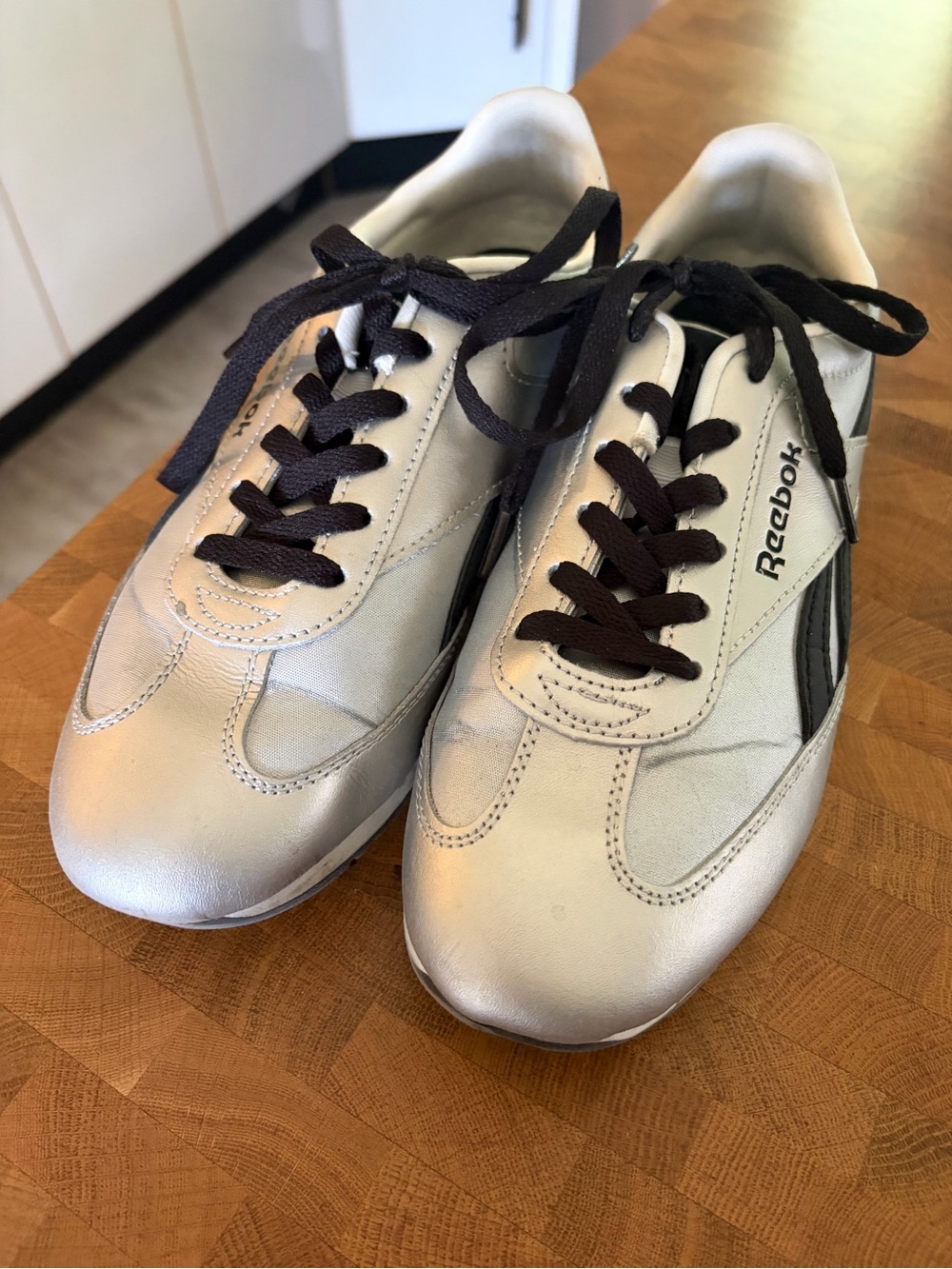 Reebok Silver and Black Low-Profile Sneakers